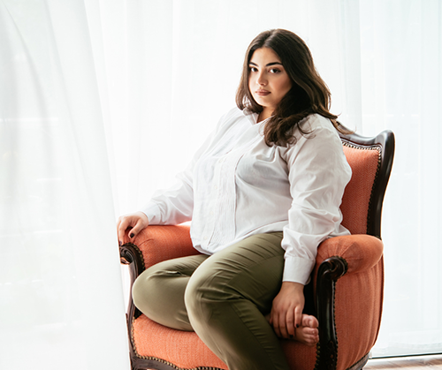 Woman sitting on a couch