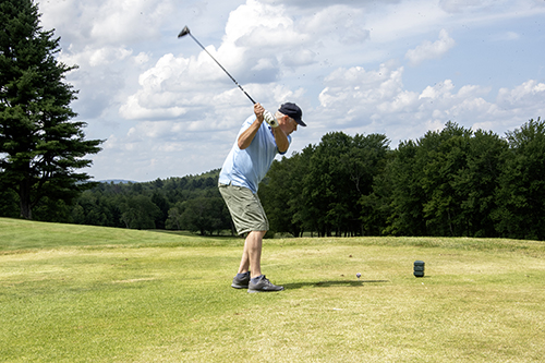 Man Golfing at 46th Annual Golf Classic